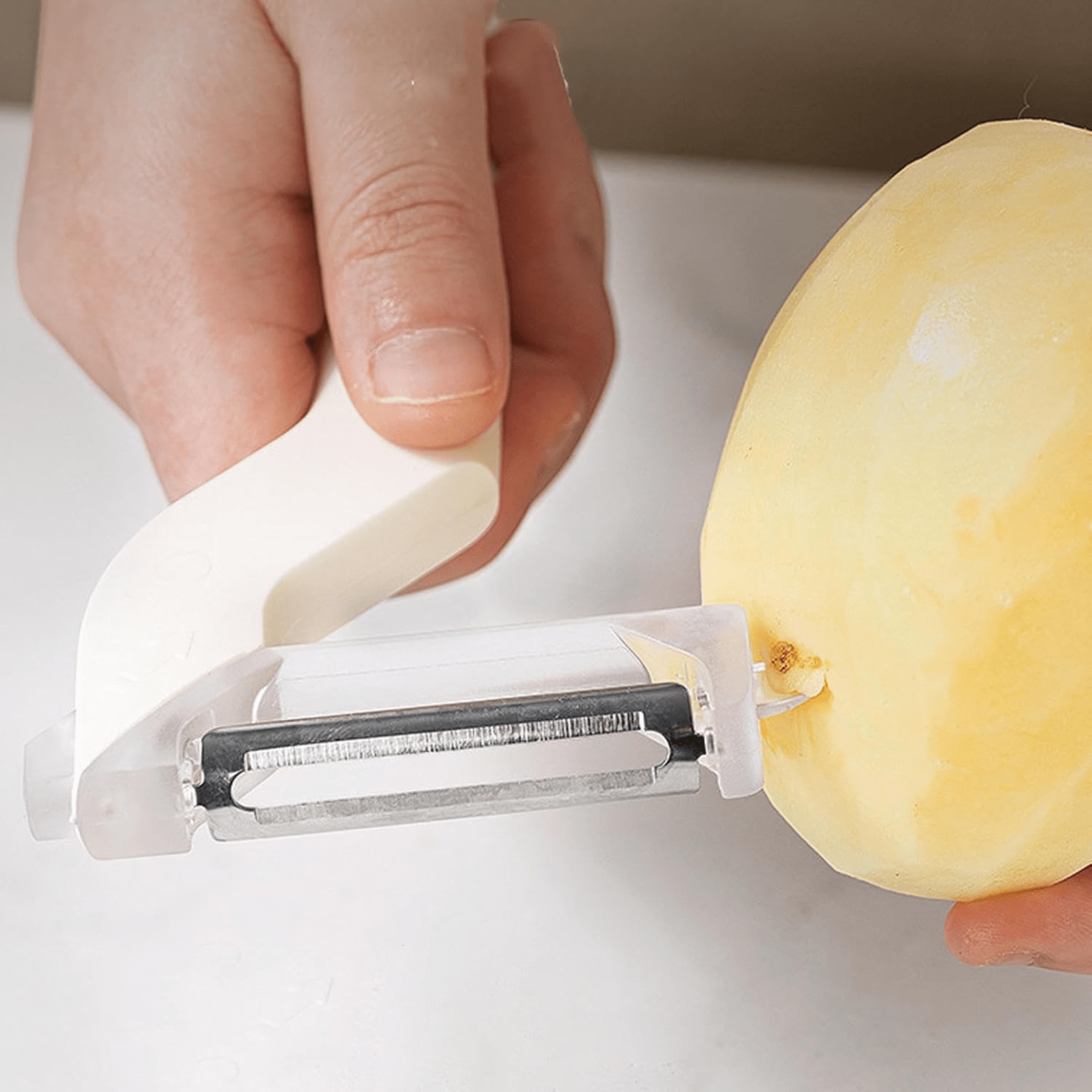 Multi-Functional Stainless Steel Fruit and Vegetable Peeler with Ergonomic Handle